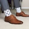 Socks with Psi Chi Seal pattern with dress shoes